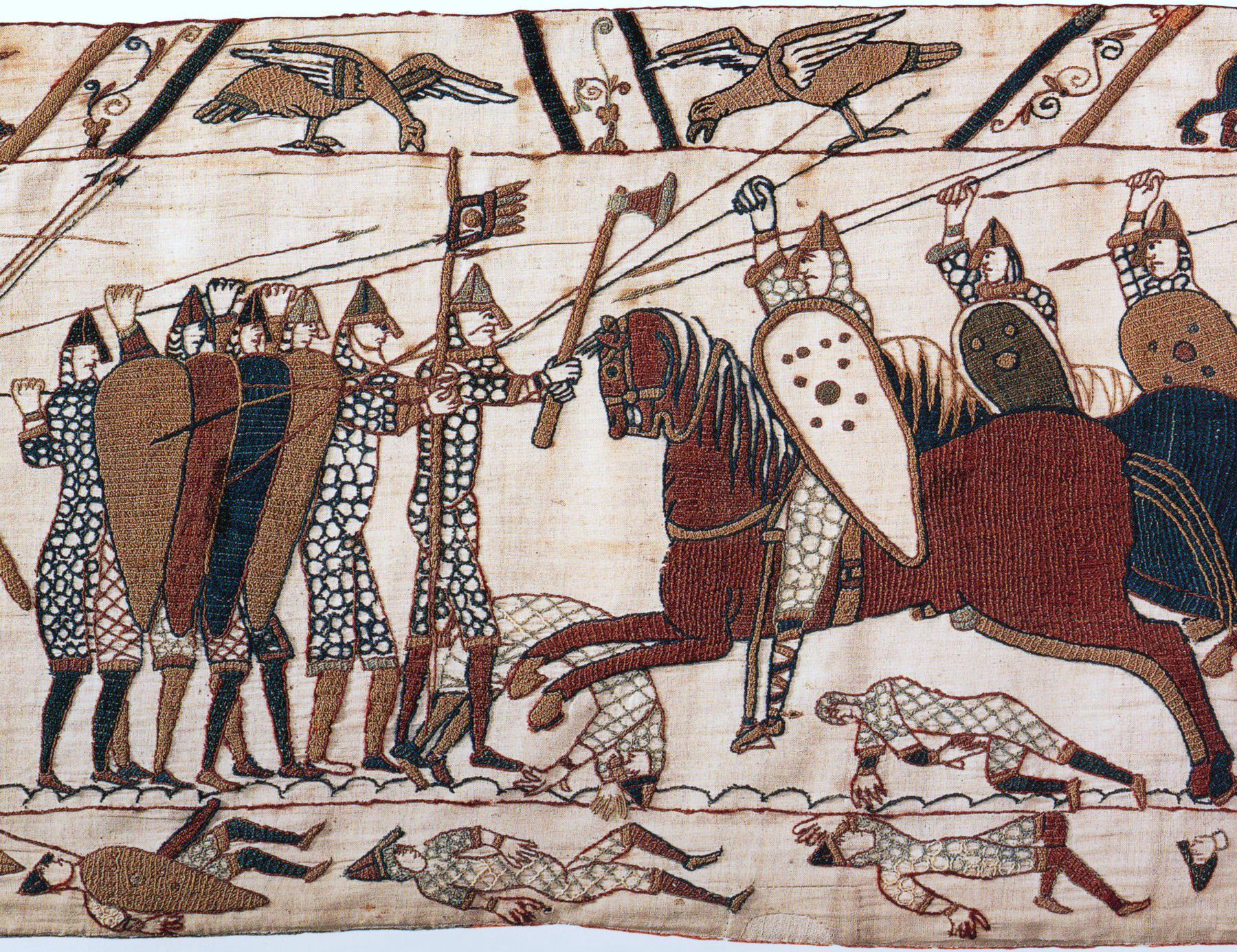 Norman horsemen (right) attack the English wall of shields