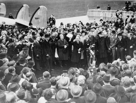 Neville Chamberlain declares "peace in our time".