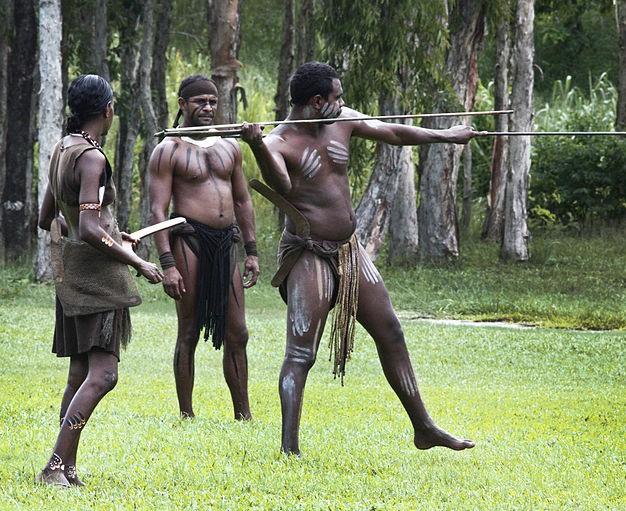 Aboriginal Australians demonstrating the spear-thrower