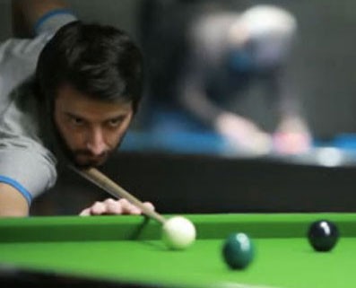 A snooker shot, demonstrating momentum