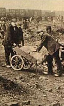 Striking miners forage for lumps of coal in 1926.