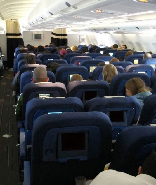Inside the passenger cabin of an airliner