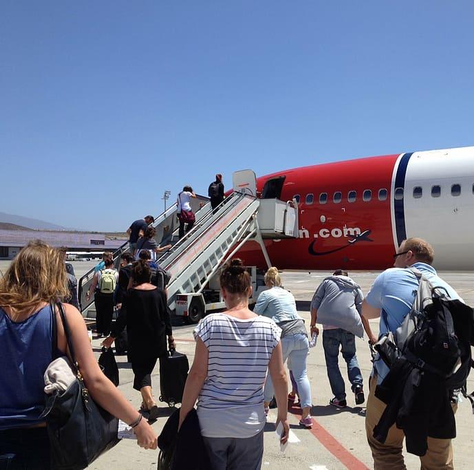 Passengers boarding an airliner