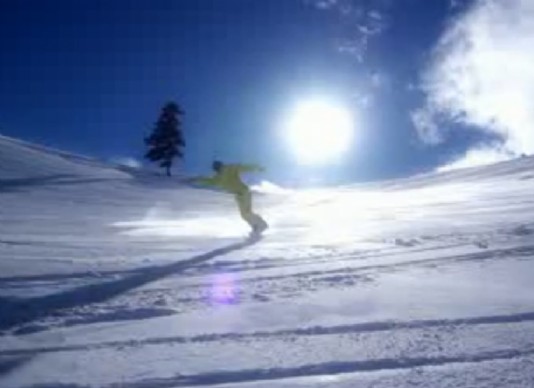 A snowboarder in slow motion.