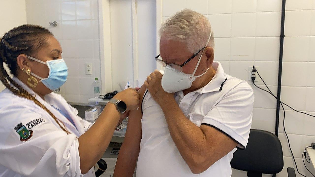 A Brazililian man receives the Covid-19 vaccine, April 2021