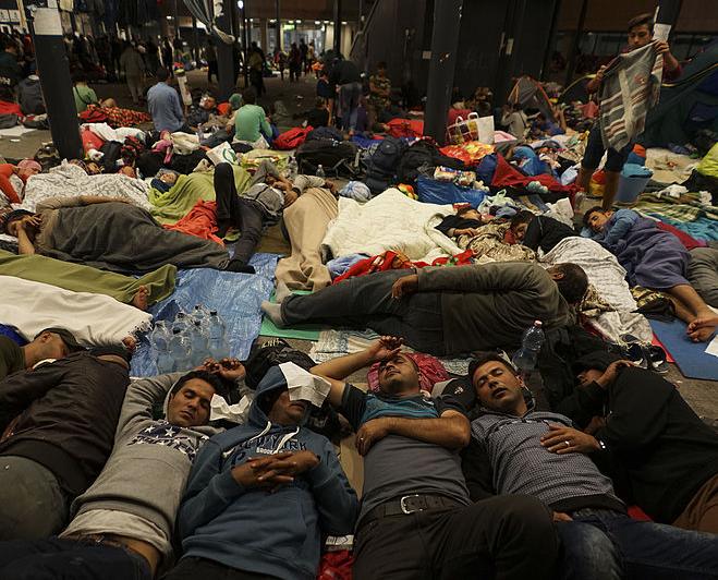 Syrian refugees sleeping at a station in Budapest, 2015