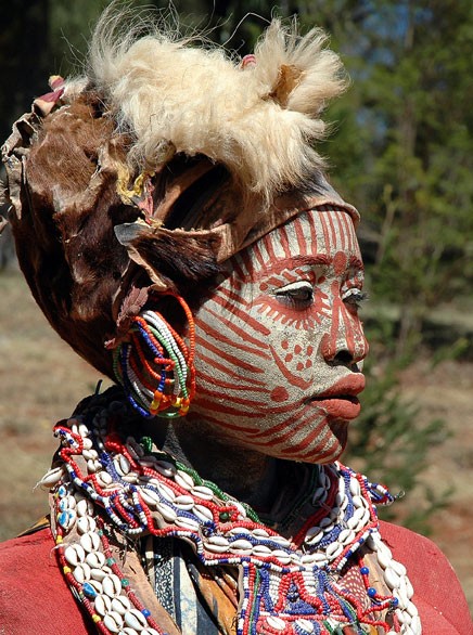 A Kikuyu woman wearing traditional dress