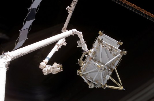 The Shuttle Remote Manipulator System in action