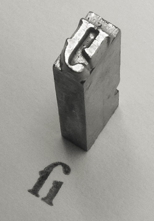 A block of cast metal type