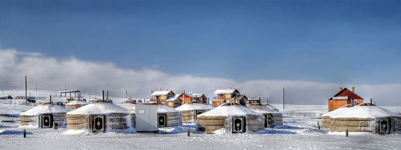 A village of yurts and modern homes