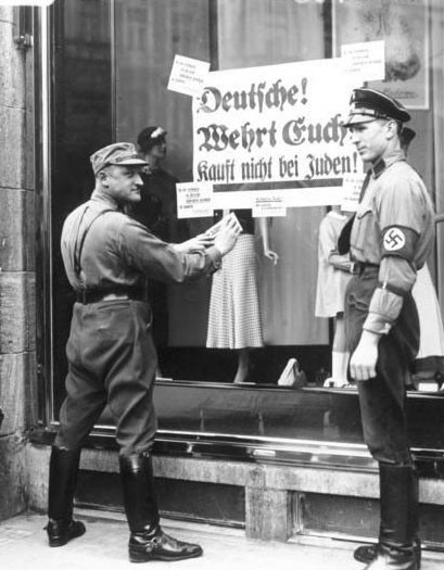 Nazis enforcing a boycott of a Jewish-run shop, 1933