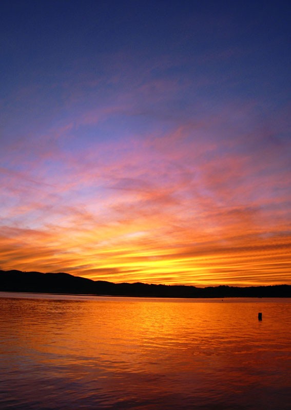 Red sky near the horizon at sunset
