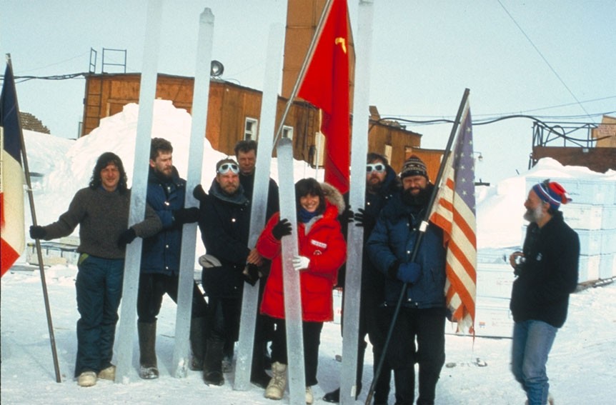 Antarctic researchers holding ice cores 