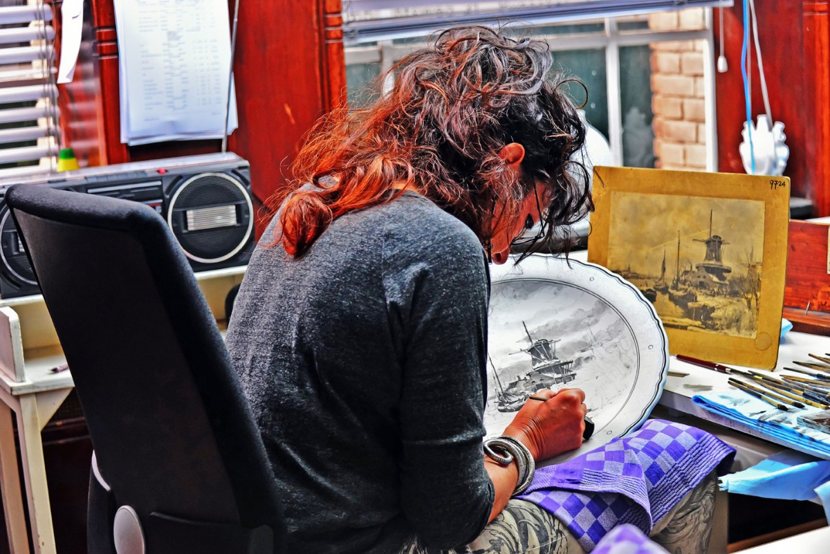 Hand painting at the Delft pottery factory