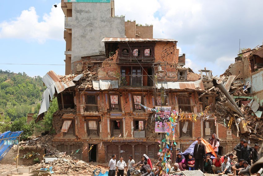 Survivors outside stricken building