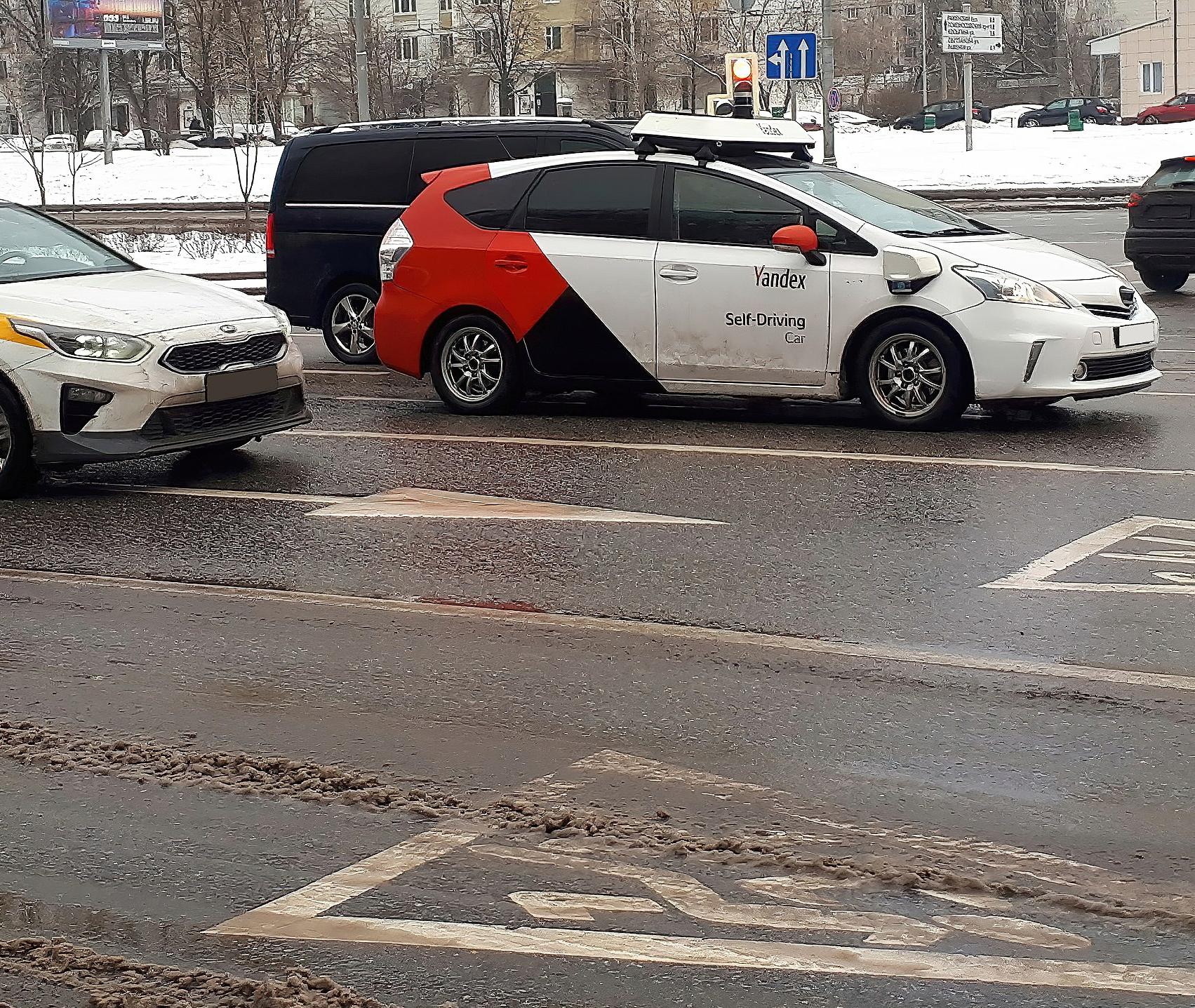 Self-driving taxi being tested in traffic
