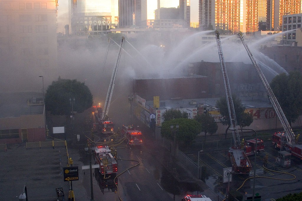 Turntable ladders in use to fight a fire
