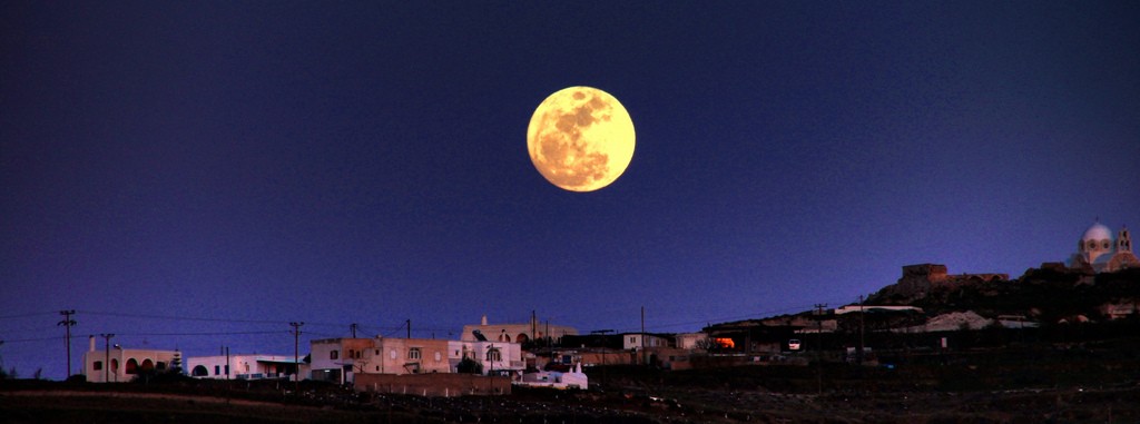 Full moon over Santorini, Greece