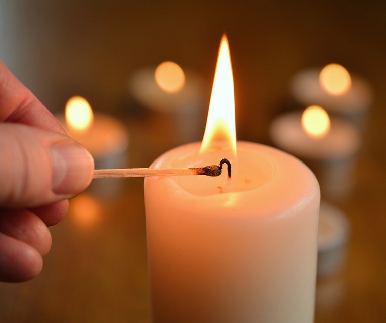 Lighting a candle