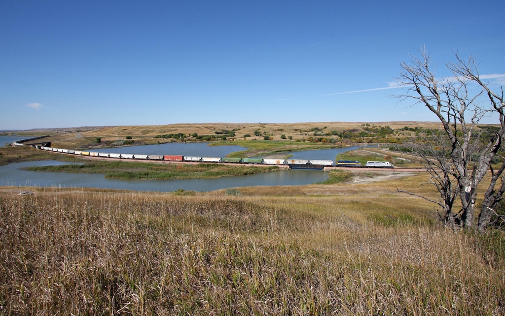 A freight train crosses the Missouri River