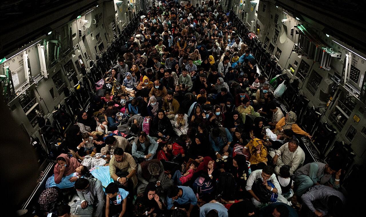 Fleeing civilians aboard a transport plane on 19th August 2021, during the withdrawal of American troops from Afghanistan