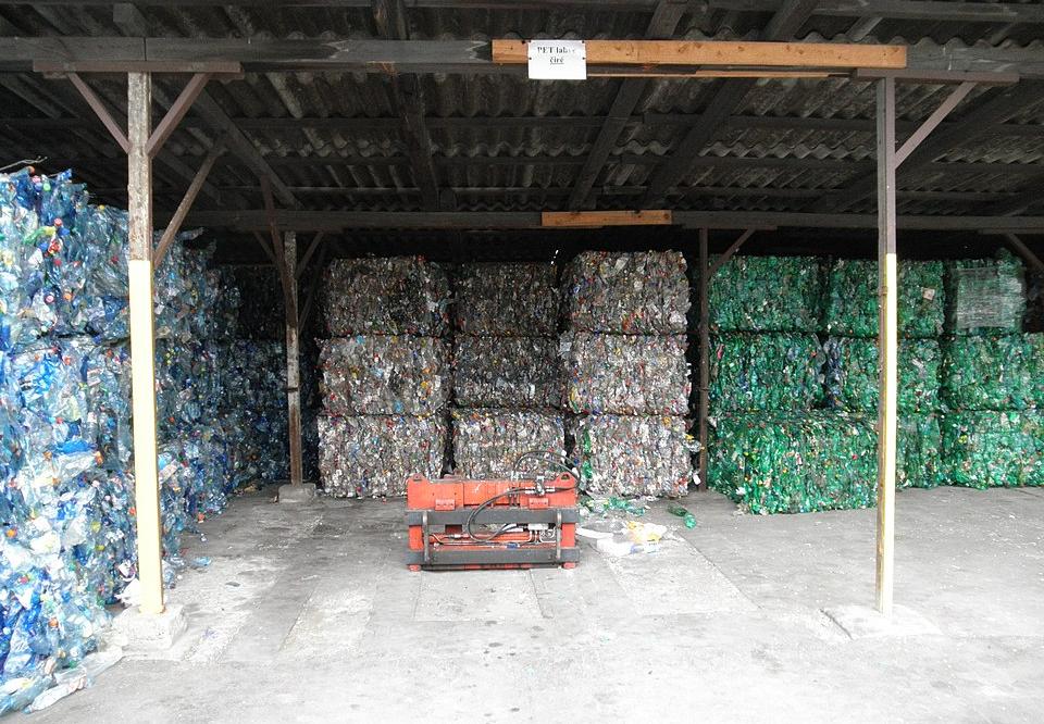 Bales of crushed plastic bottles sorted according to colour