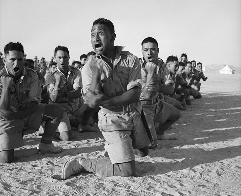 Maori troops performing a haka during World War II