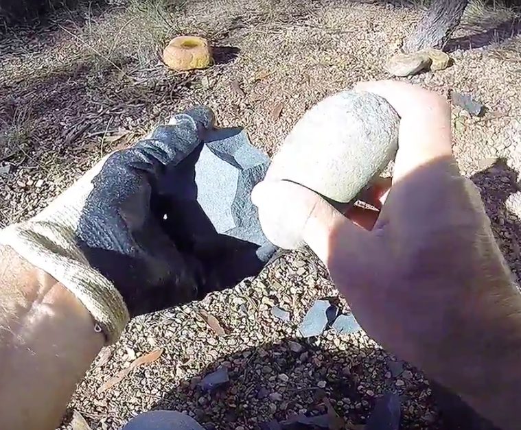 Using a hammerstone to strike flakes from a core