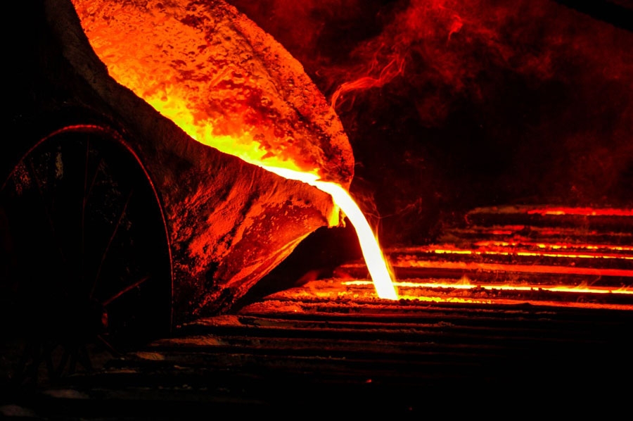 Melted iron is poured into a mould.