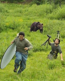 Adrenaline flows as these men run away from a bear