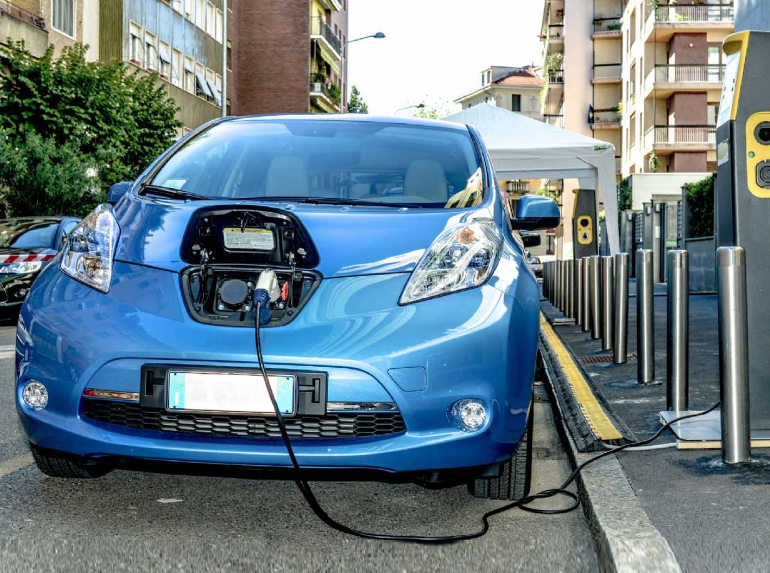 An electric car being recharged