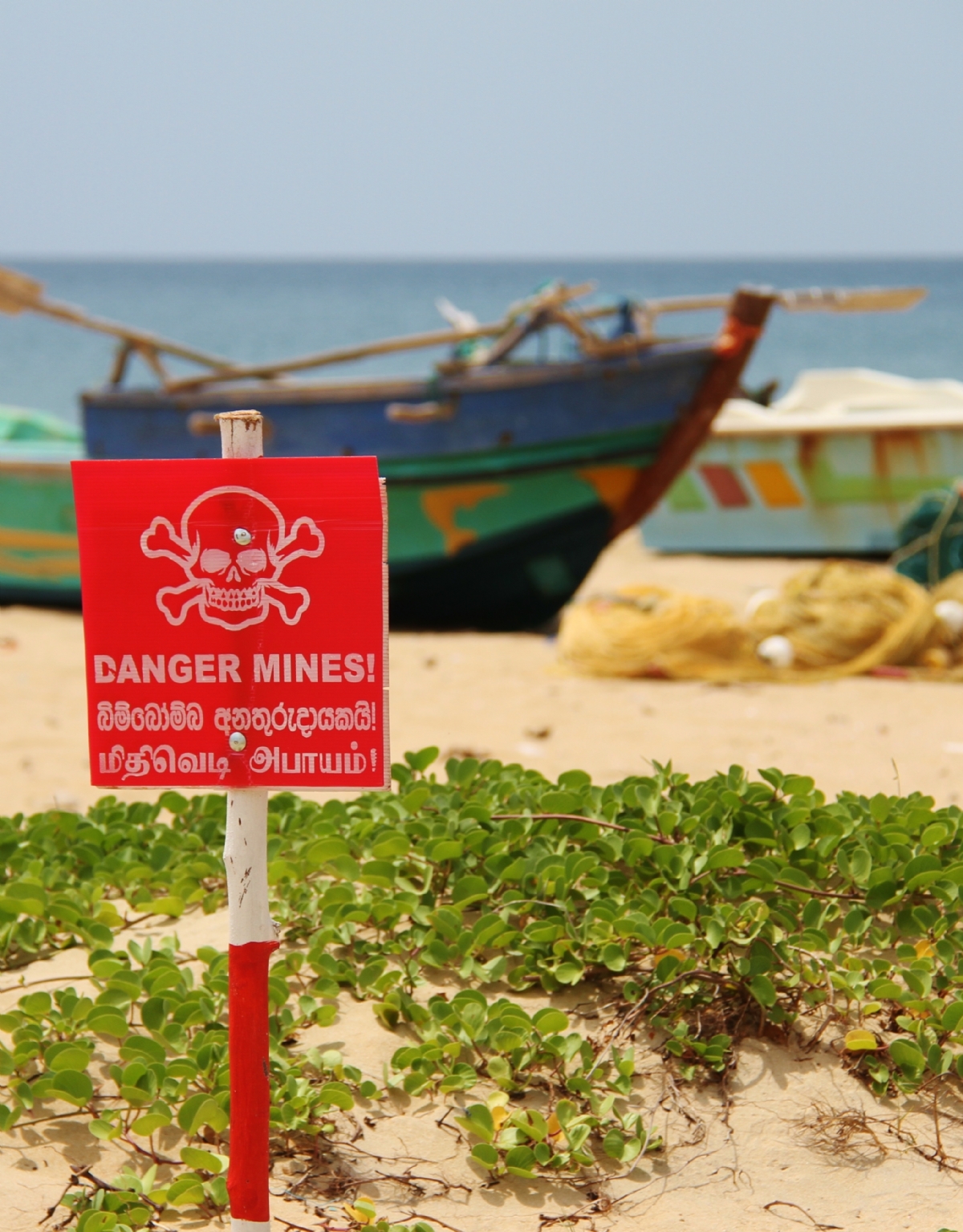 Minefield warning sign on a beach in Sri Lanka