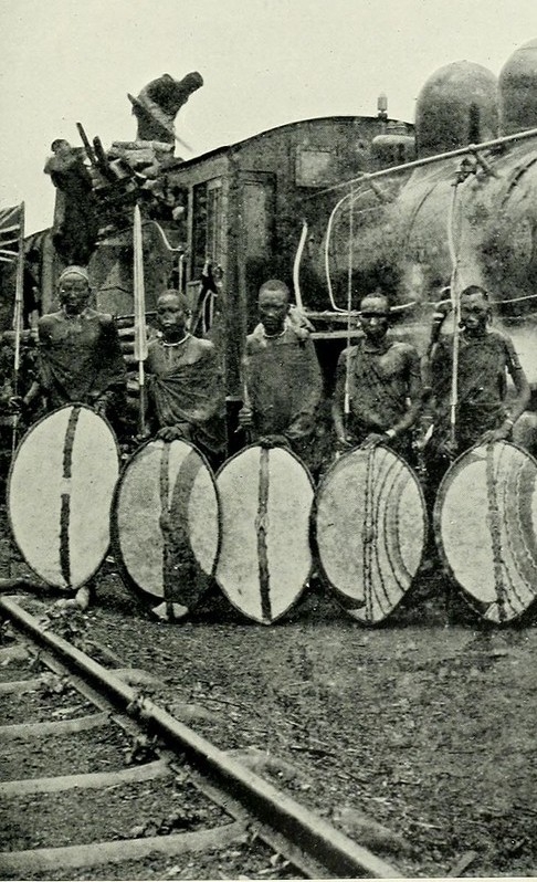 Maasai warriors guarding a train on the Uganda Railway