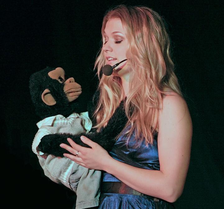 A ventriloquist performing with her dummy in Sweden.