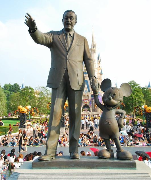 A statue of Walt Disney and Mickey Mouse today