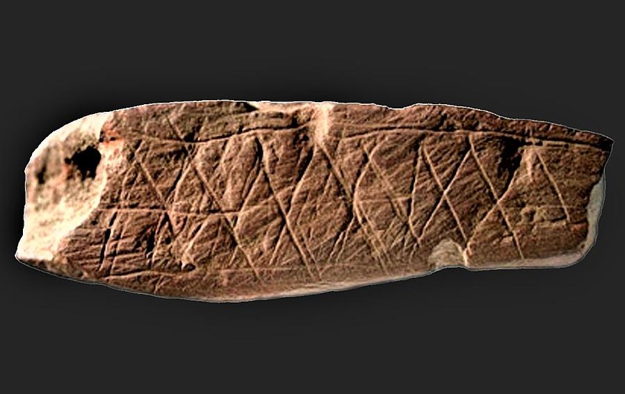 Engraved rock, 70–100,000 years old