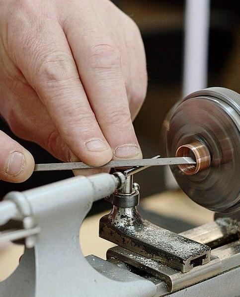 Making a watch part from copper using a lathe
