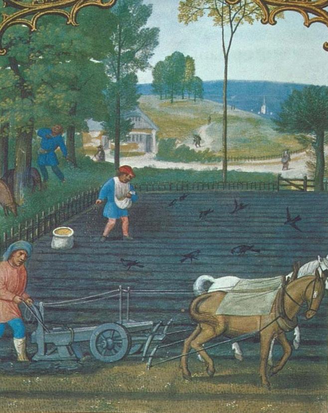 A farmworker using a plough in medieval times