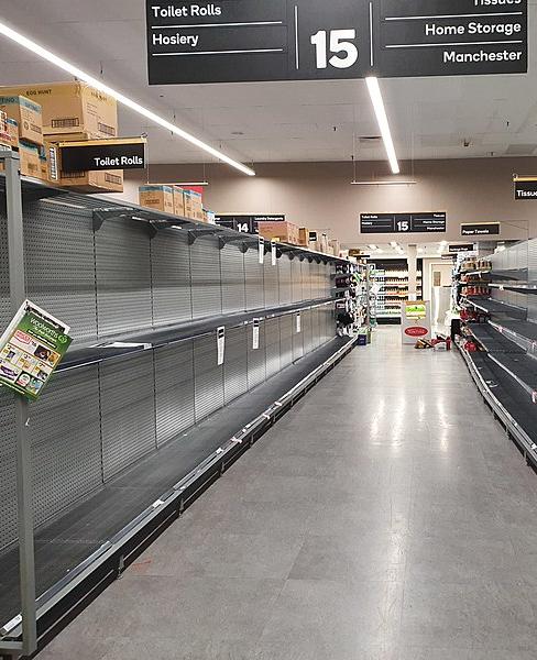 Empty shelves in a supermarket after panic buying, March 2020