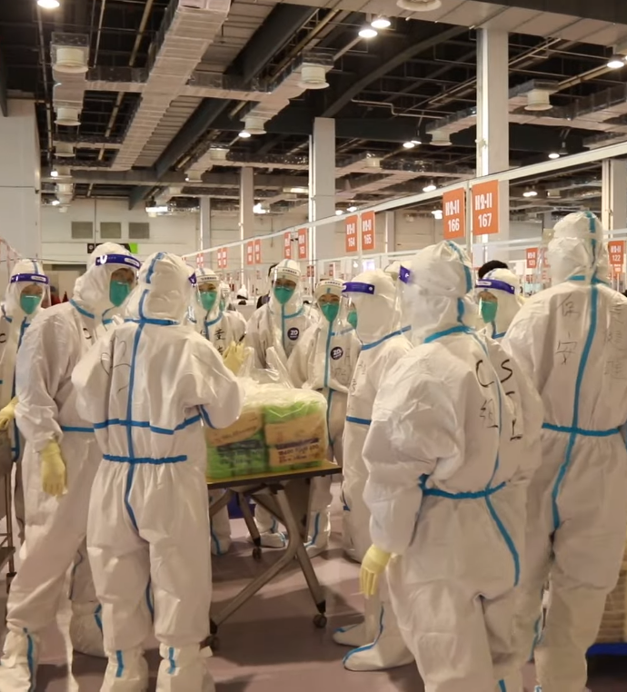 Health workers at an emergency hospital in Shanghai