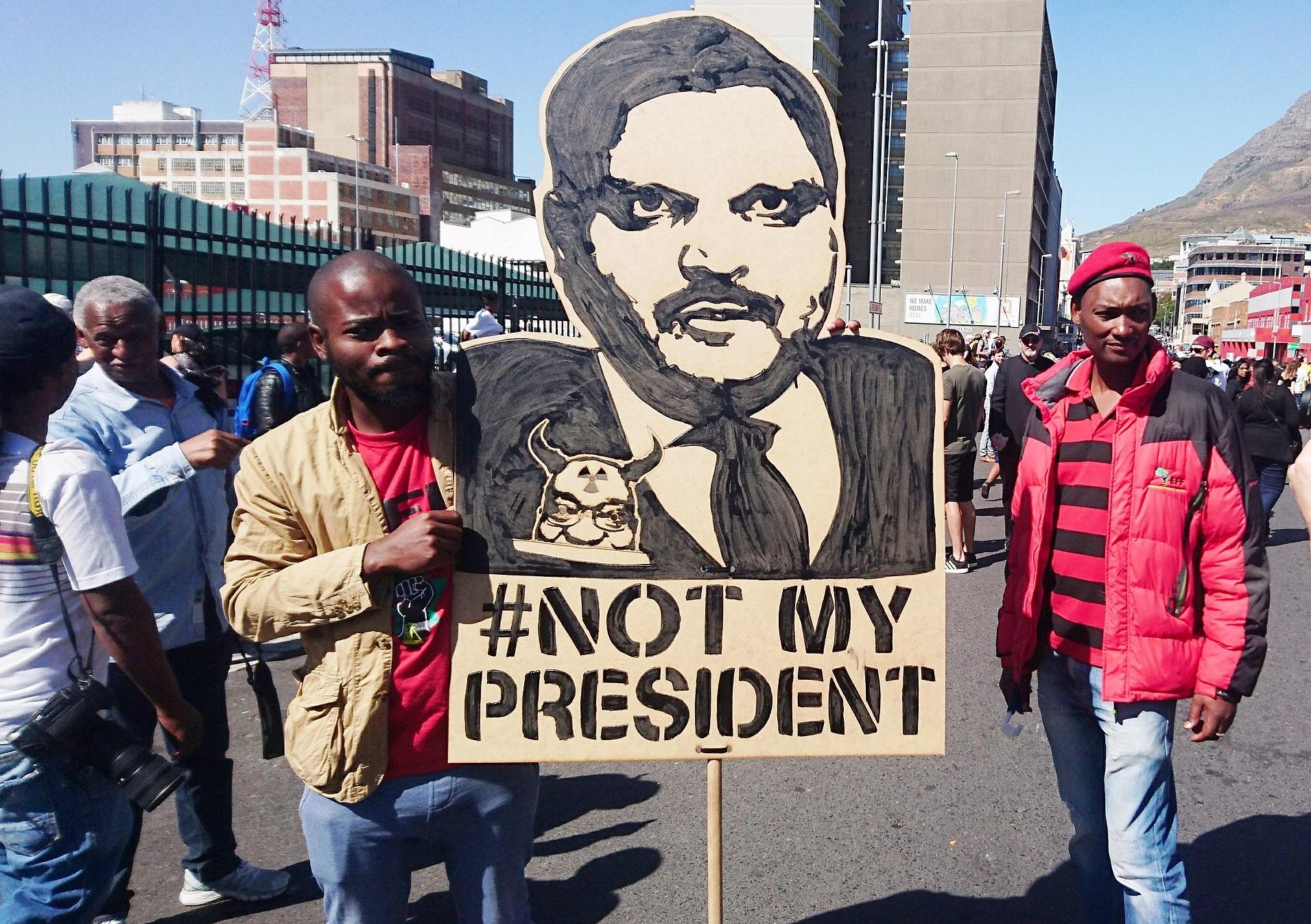 A placard at a Zuma Must Fall protest in Cape Town, 2017