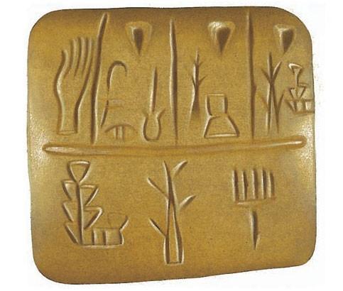 Sumerian pictograms carved on a stone slab