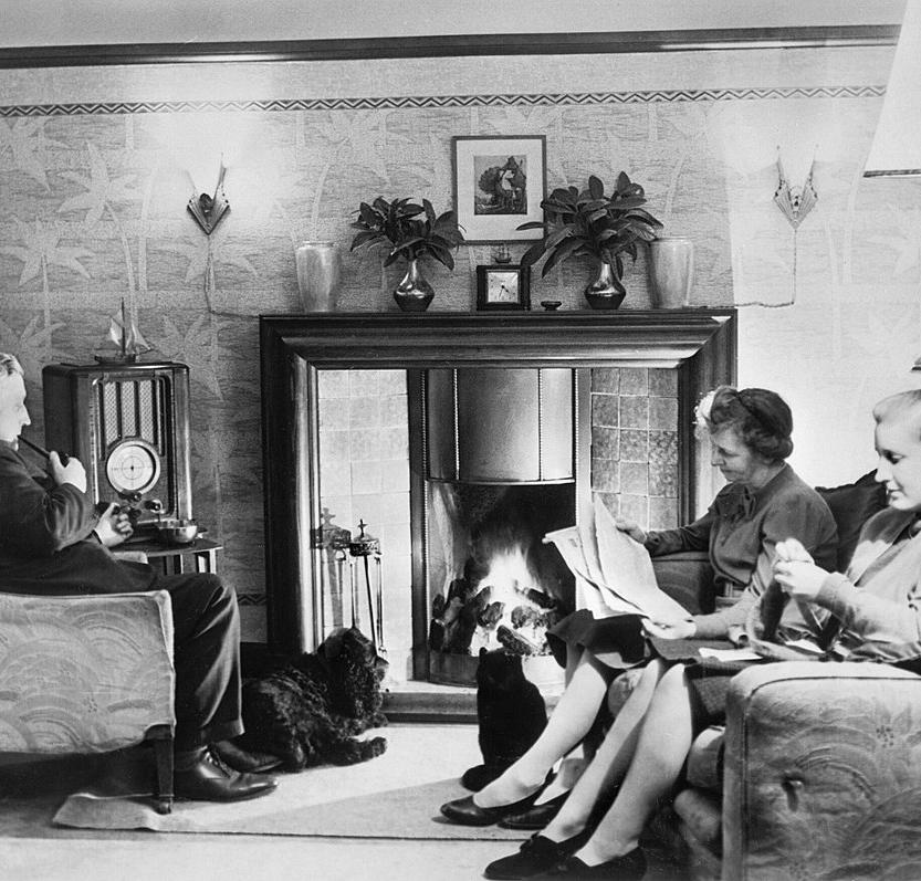 A family listening to the radio