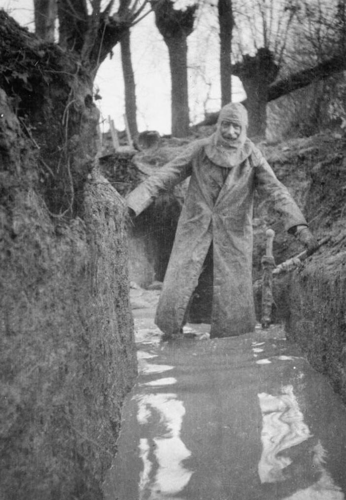 Officer in a waterlogged trench, January 1915