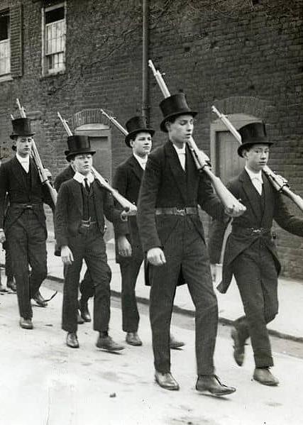 Boys of Eton College, a public school, practise drill in 1915