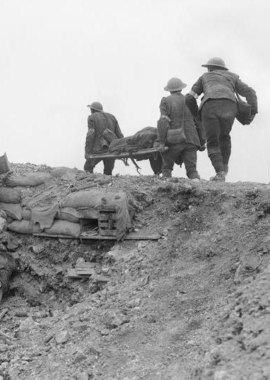 Stretcher bearers carry a casualty of Battle of the Somme
