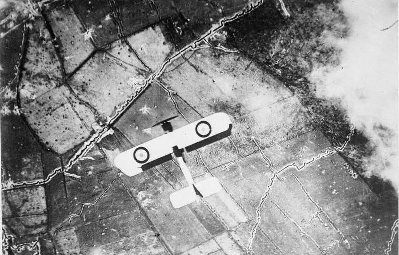 An RFC aircraft on a reconnaissance mission over trenches, 1916