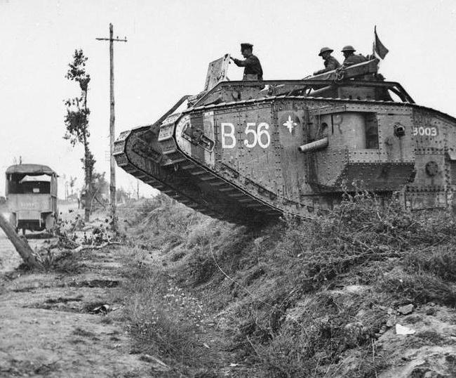 A British tank crosses a road during the Battle of Amiens