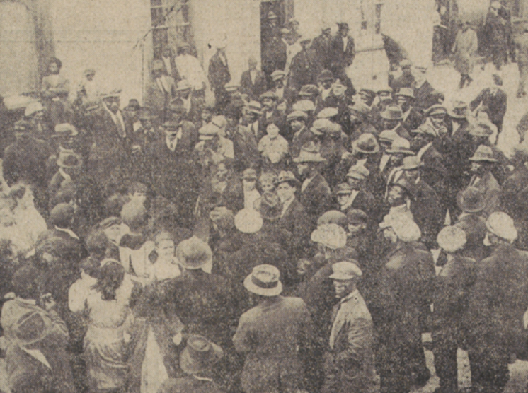 A man urges restraint during the Cardiff race riots of June 1919