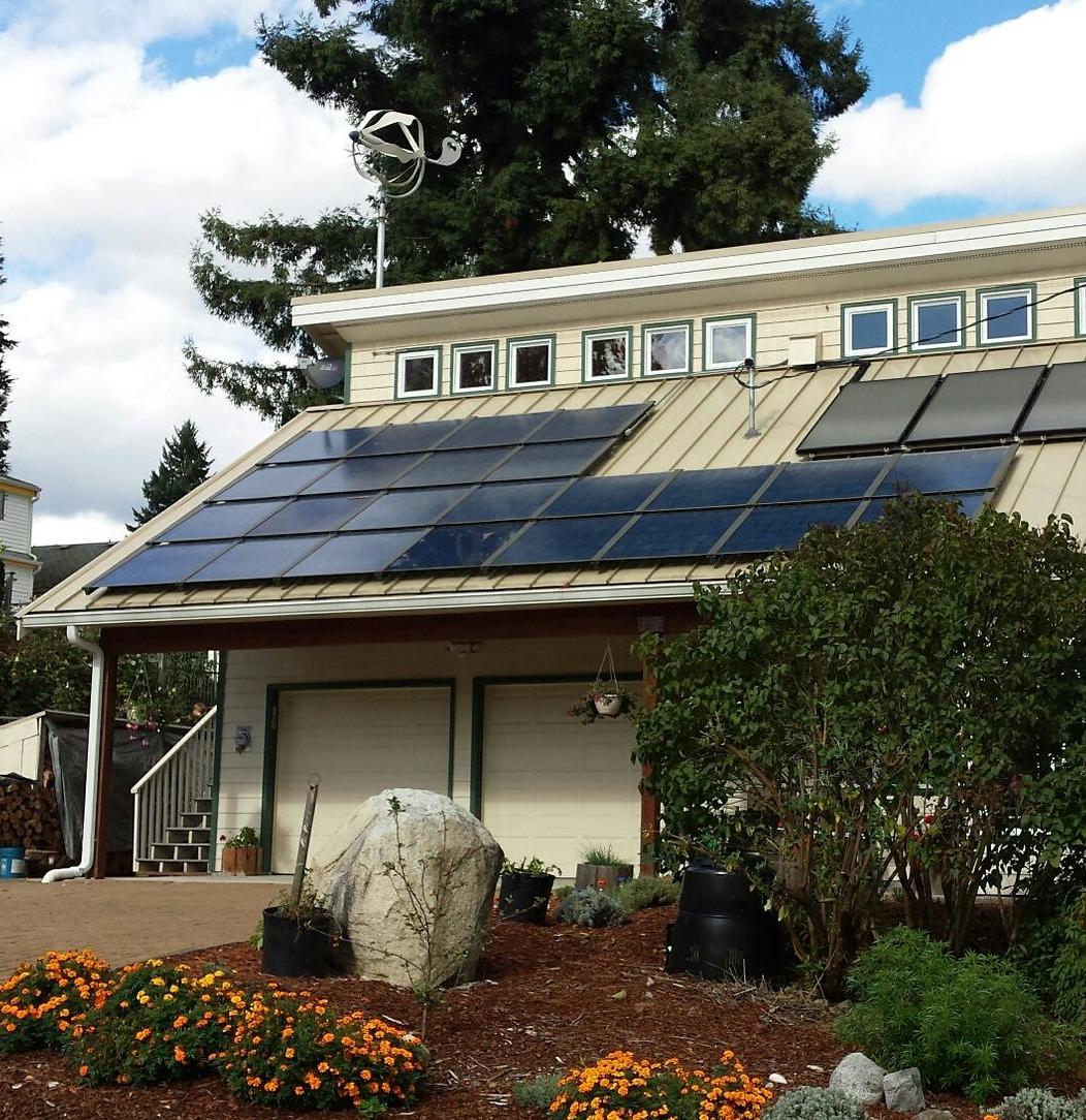 House with solar panels and wind generator, Washington State